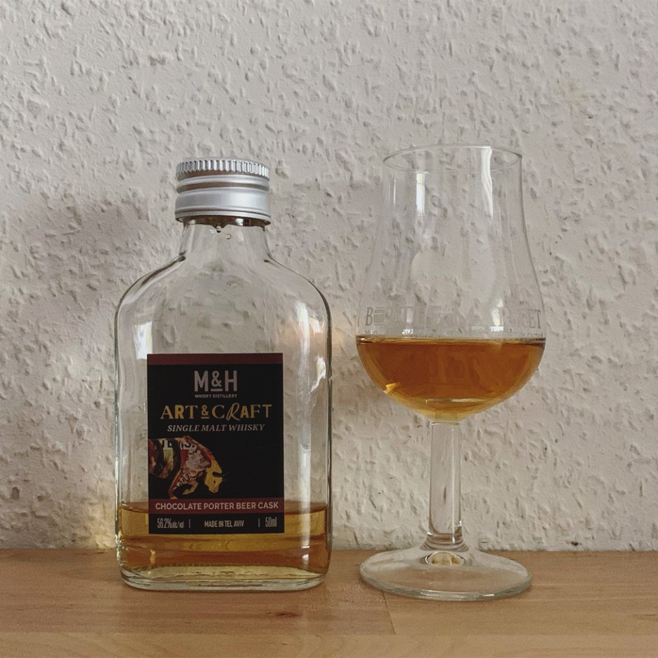Dram shot of The M&H Distillery's "Art & Craft" single malt whisky releases from craft beer casks