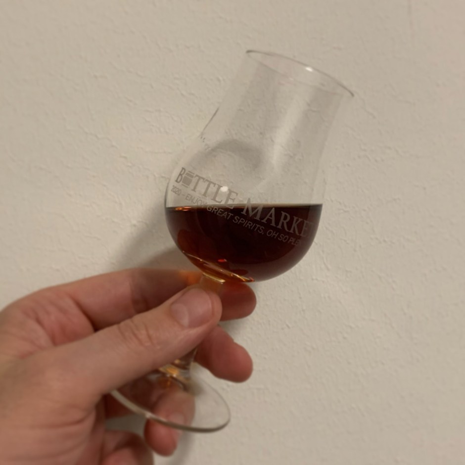 Dram shot of Mosgaard Black Peat Danish Single Malt Whisky